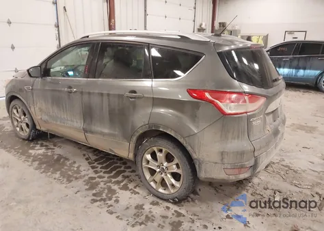 2014 Ford Escape Titanium z USA, uszkodzony, nr VIN 1FMCU0JX5EUC57244